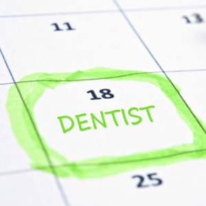 Dentist appointment written on calendar